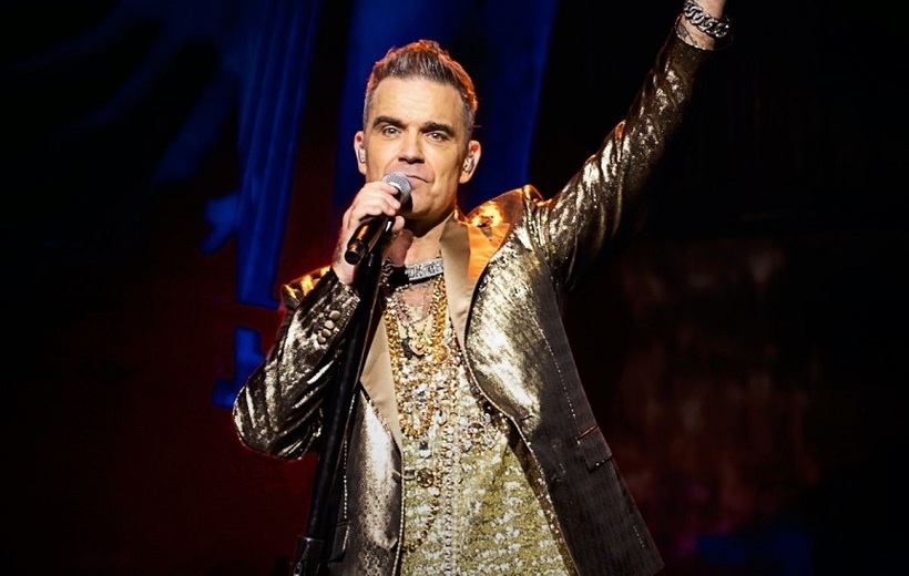 Robbie Williams, care va cânta la festivitatea de deschidere a CM a cluburilor alături de Laura Pausini, a fost numit ambasador muzical al FIFA